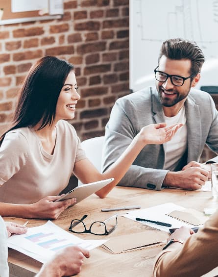 The Real Value team collaborating in a meeting